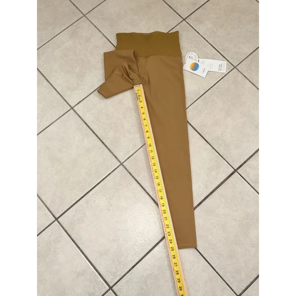 VUORI RIB STUDIO LEGGING 25”DARK GOLDEN COLOR SIZE XS NWT